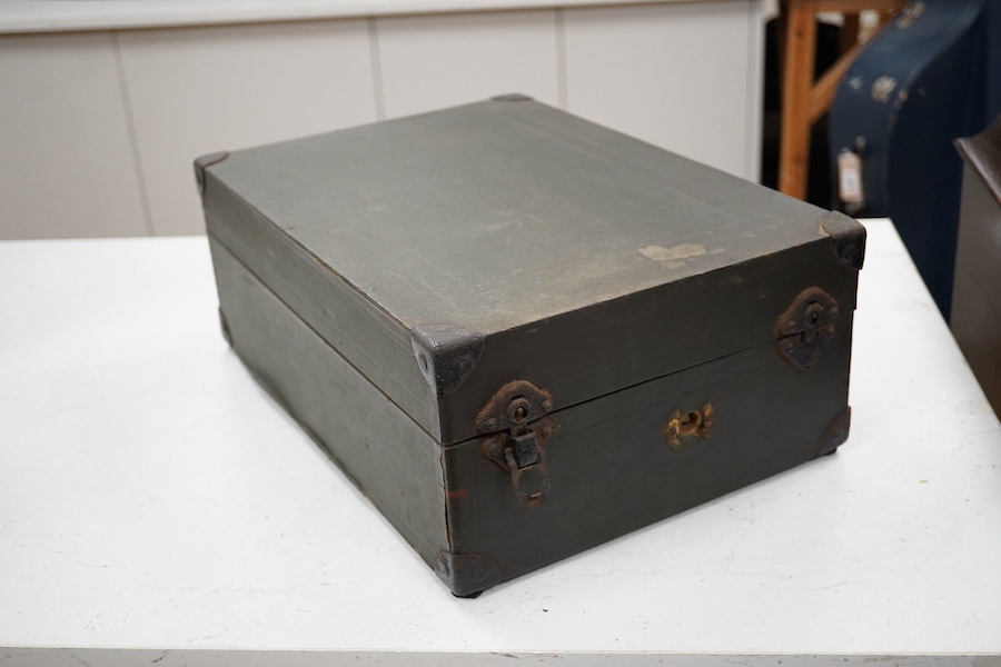 Two gramophone players; an oak cased HMV tabletop gramophone on a similar style mahogany gramophone record stand, height of stand 72.5cm, together with a May-Fair Deluxe Model portable gramophone player. Condition - poor